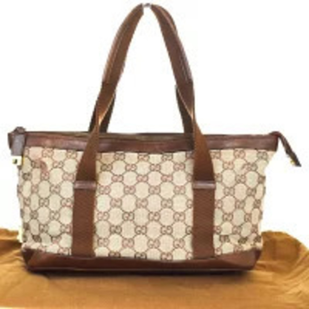 Gucci GG Canvas Handbag monogram canvas brown leather
